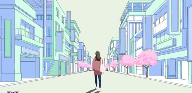 A lonely person walks along an empty city street.