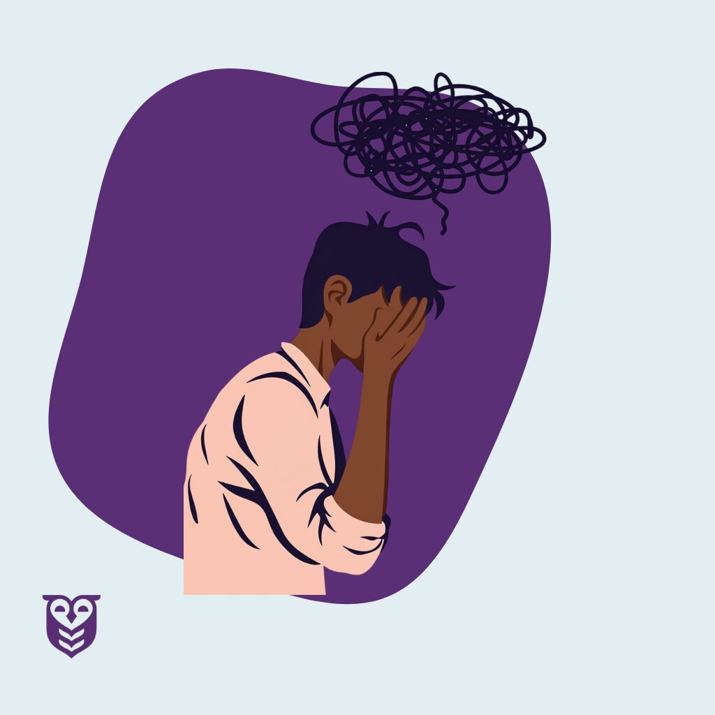 Man in distress with head in his hands and depressed and anxious