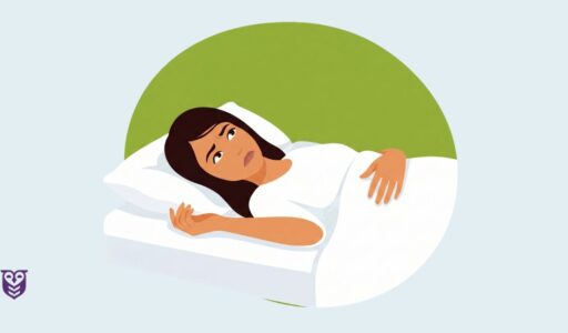 Woman lying in bed on white sheets, unable to sleep.